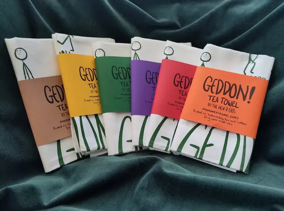 Flat lay of the Geddon tea towel