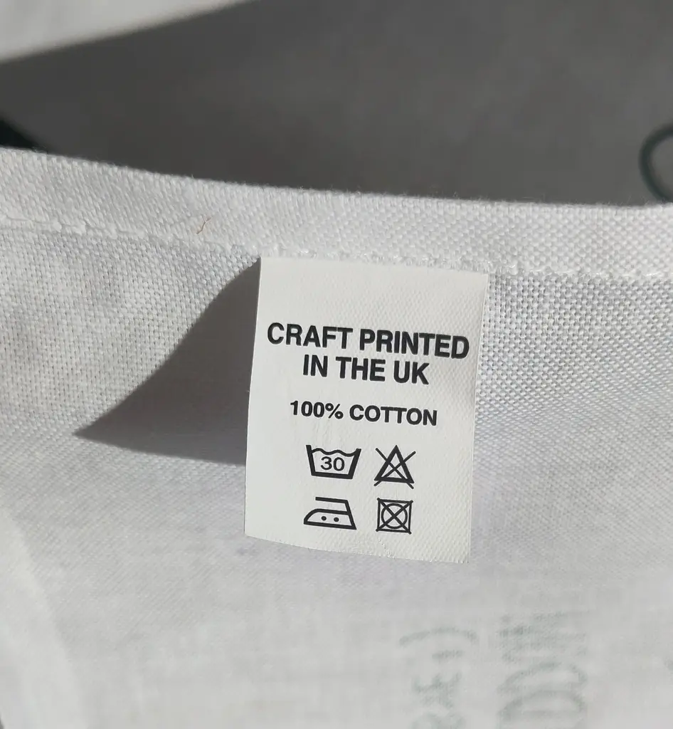 Geddon tea towel label